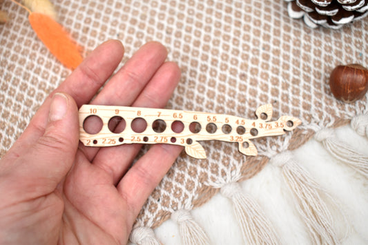 Knitting needle gauge branch