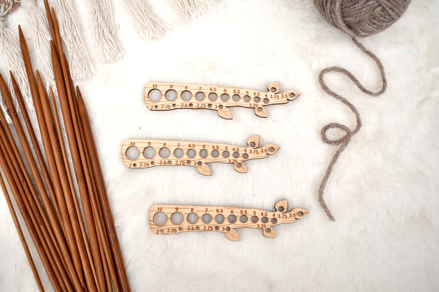 Knitting needle gauge branch