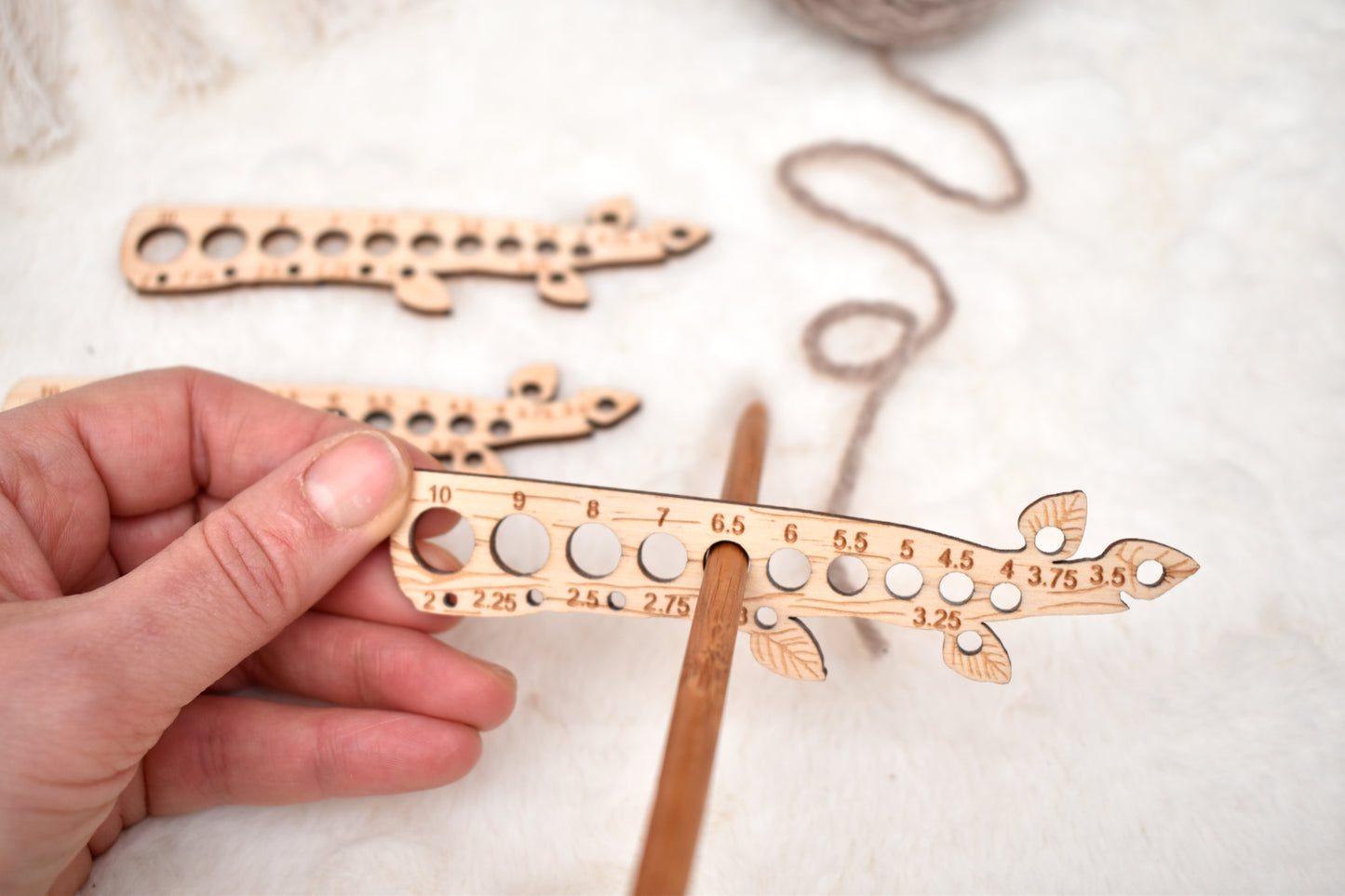 Knitting needle gauge branch