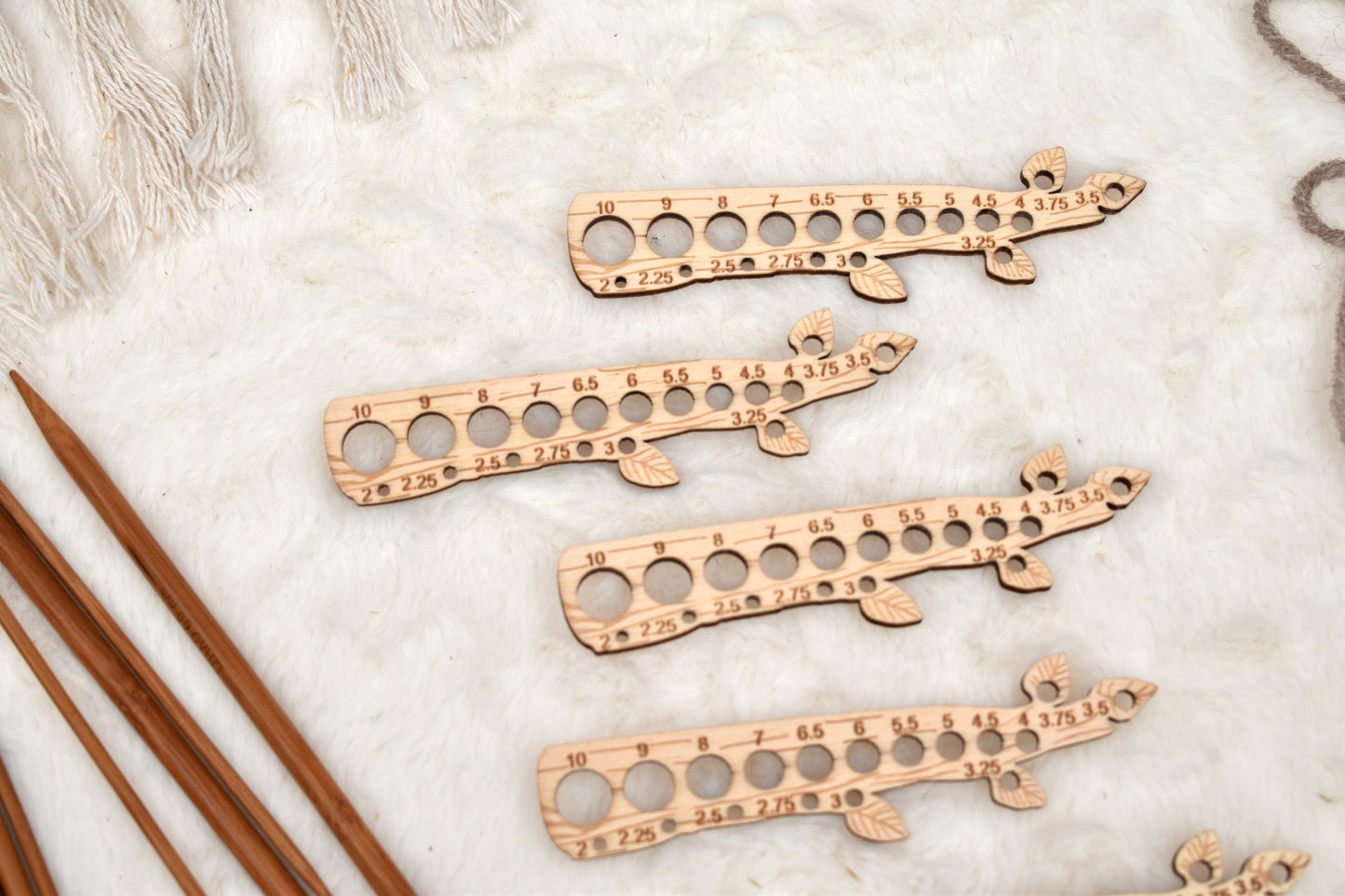 Knitting needle gauge branch