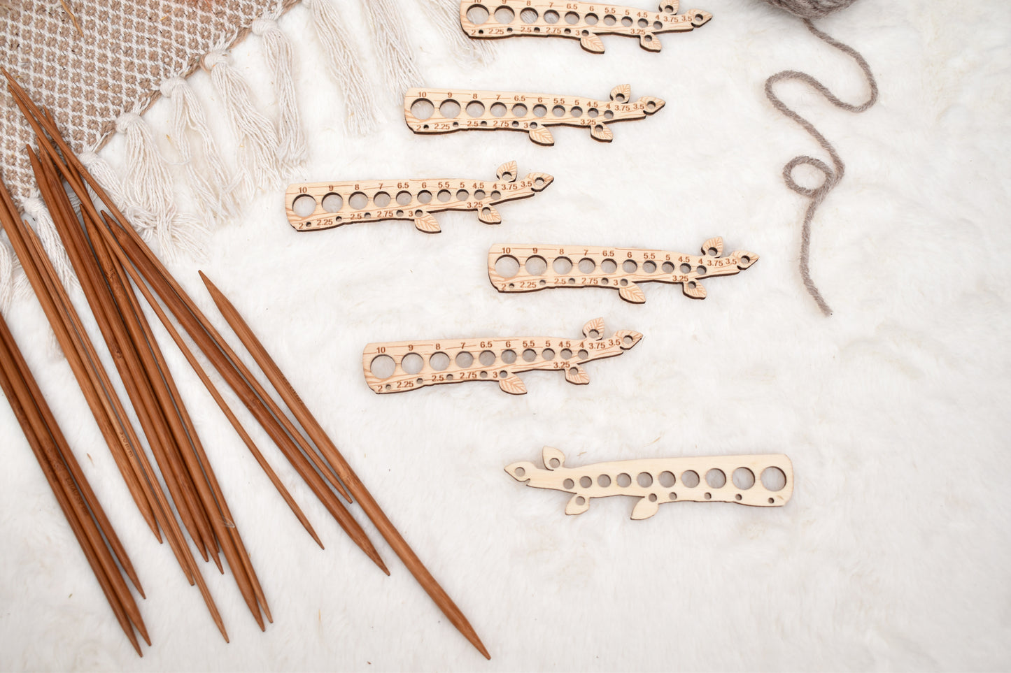 Knitting needle gauge branch