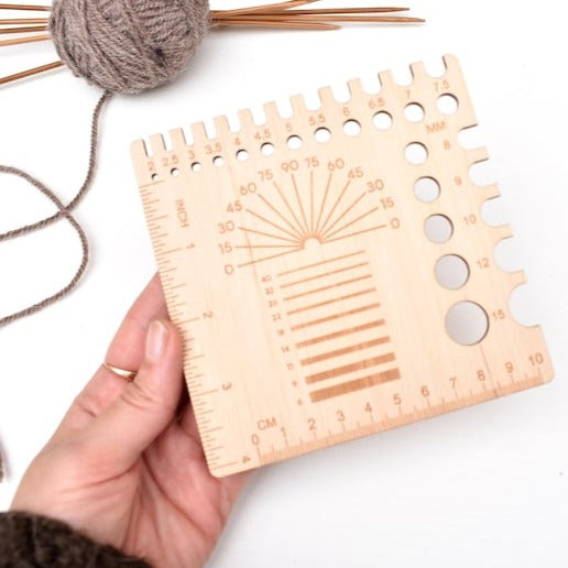 All in one needle gauge and Yarn/Wool spinning tool