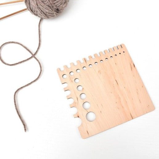 All in one needle gauge and Yarn/Wool spinning tool